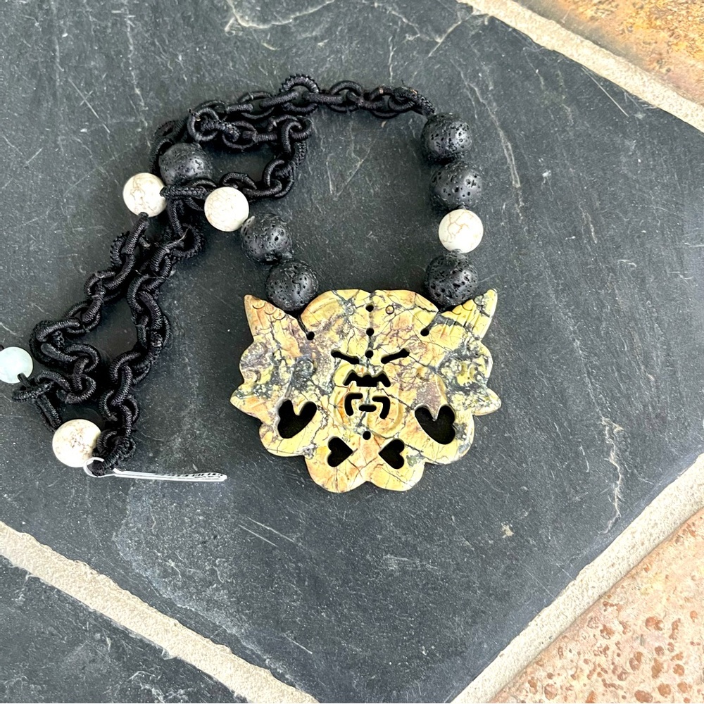 Unisex One of a kind Carved Turquoise, Lava & corded 19” necklace.
